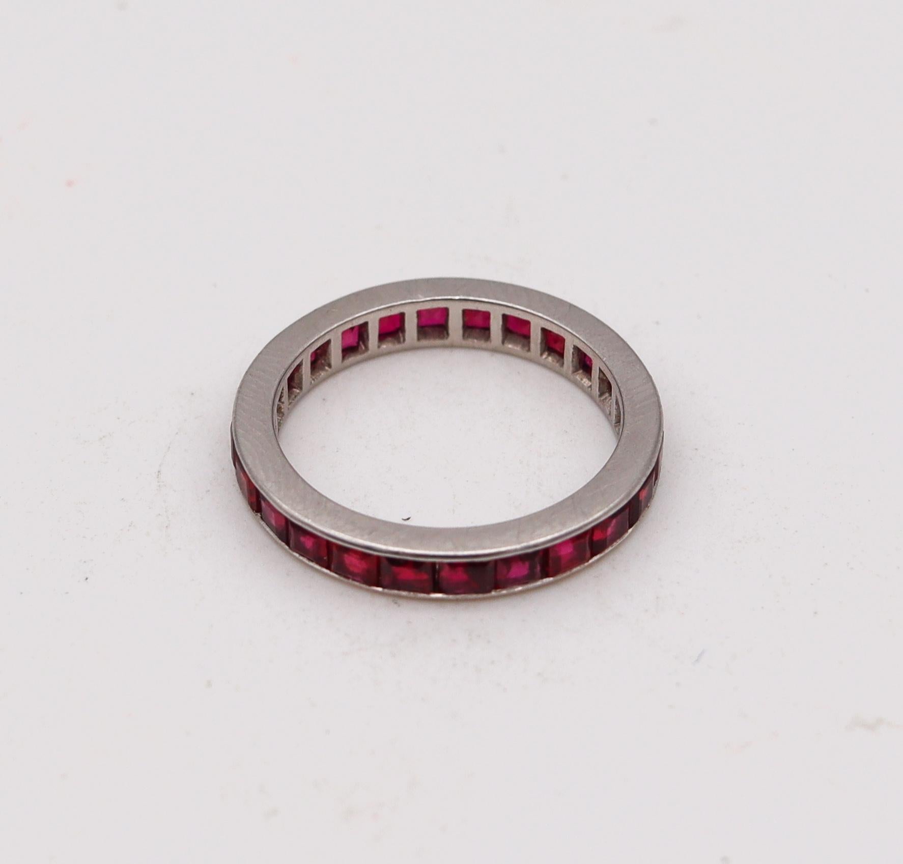 An eternity ring band with natural rubies.

Art-Deco eternity band ring crafted in America, circa 1930. It was crafted in solid .900/.999 platinum, with high polished finish and is mounted in a channel setting with 24 calibrated French squared cuts