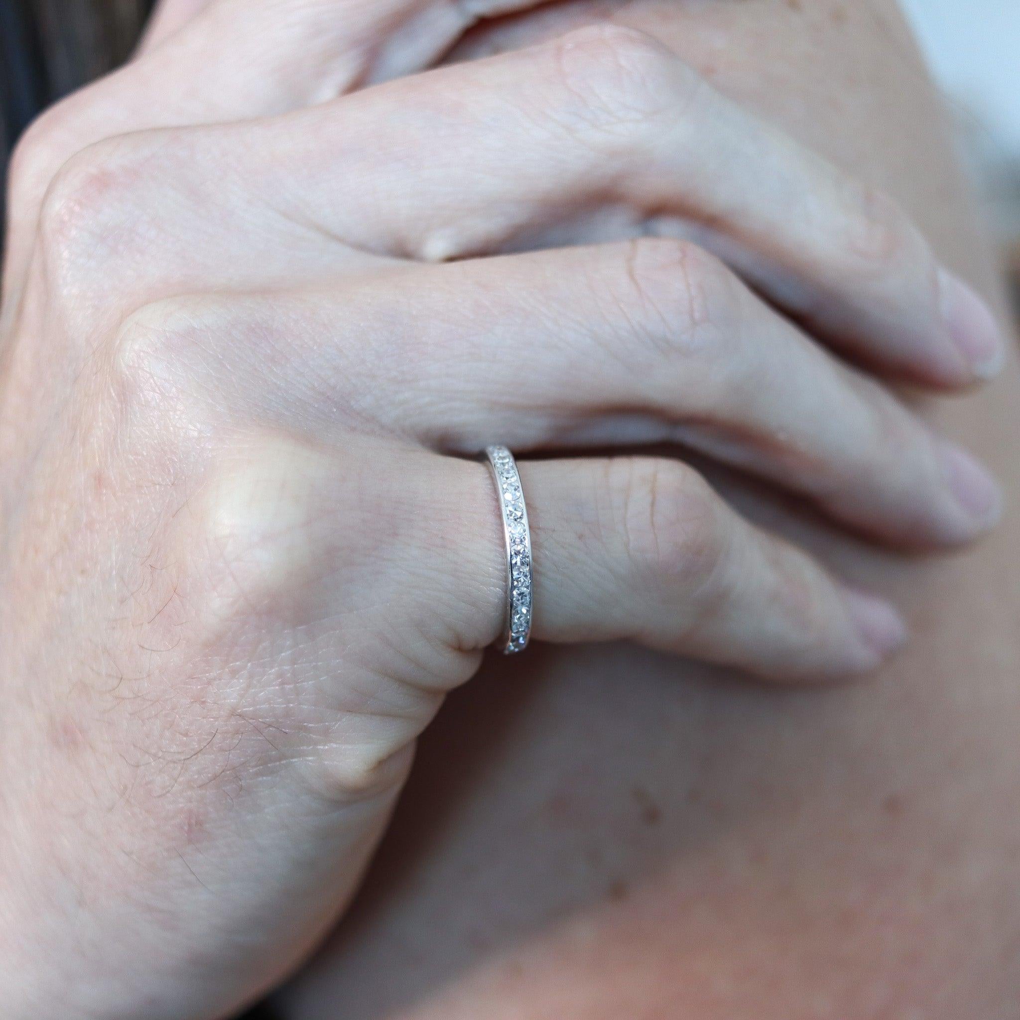 Art deco eternity ring band with European diamonds.

Beautiful antique eternity band ring, created in America during the Art Deco period, back in the 1930. The ring have been crafted in solid .900/.999 platinum with high polished finish and