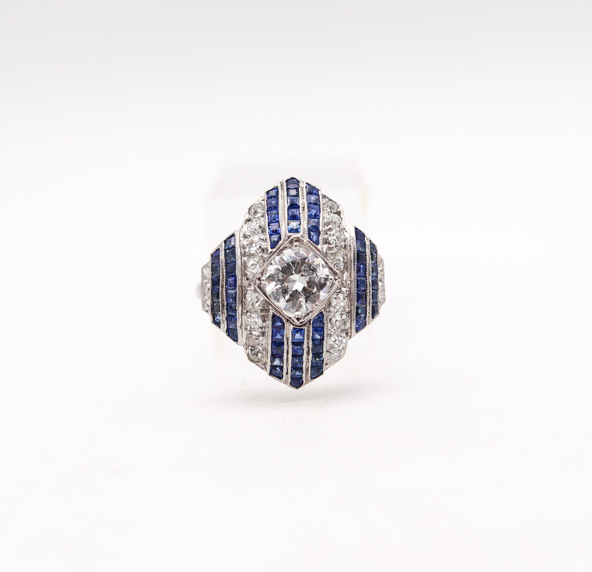 An art deco platinum ring with sapphires

Beautiful antique cocktail ring, created in America during the art deco period, back in the 1930. This beautiful ring was crafted in solid platinum and mount with a great selection of natural gemstones. The