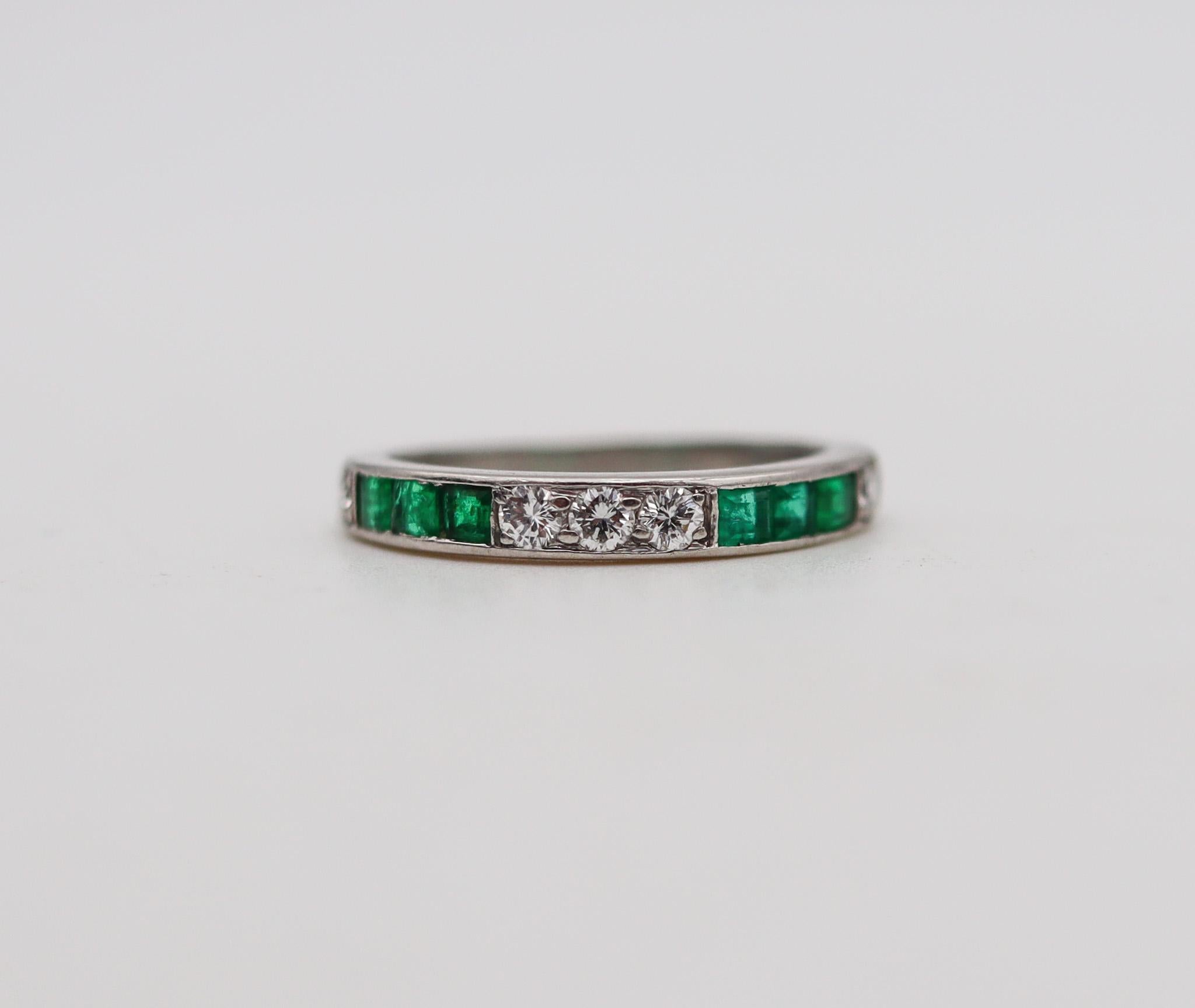 Eternity ring band with natural Gemstones.

A beautiful and colorful half eternity band ring created during the American art deco period, back in 1930. This elegant ring has been crafted in solid .900/.999 platinum with high polished finish and