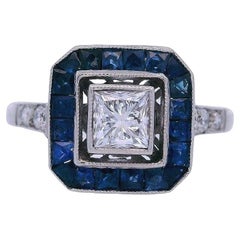 Anello aureolato Art Deco 1930 in platino con diamanti e zaffiri blu