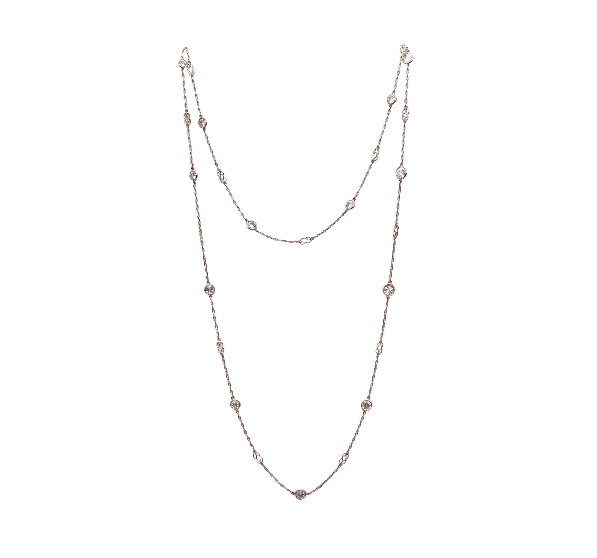 Art-Deco diamonds stations long chained necklace sautoir

A classic piece from the American art-deco period, created at the beginnings of the 1930's. It was carefully crafted in solid .950/.999 platinum and designed as a long chained sautoir, with