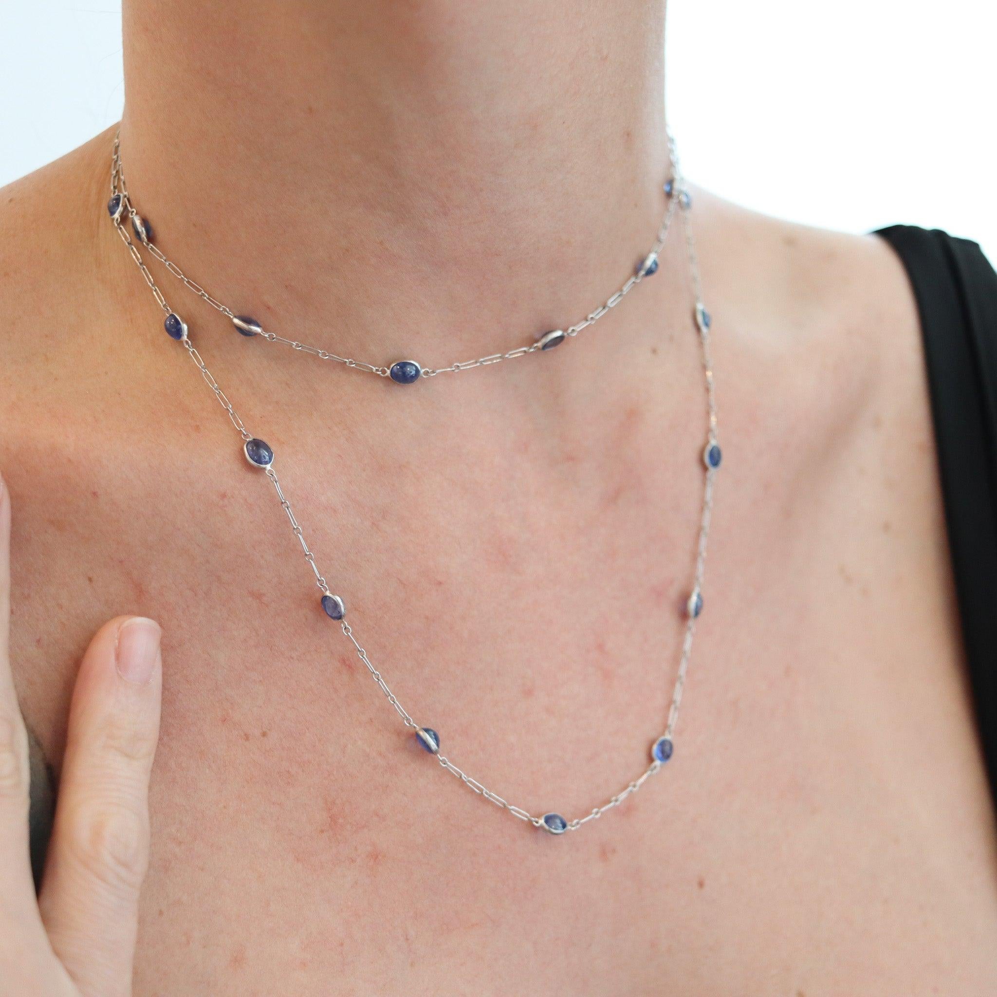 Art-Deco sapphires stations chain necklace sautoir.

This is a gorgeous stations long sautoir, created in America during the art-deco period, back in the 1930's. It was designed as a chain displaying twenty-eight blue sapphires divided in stations