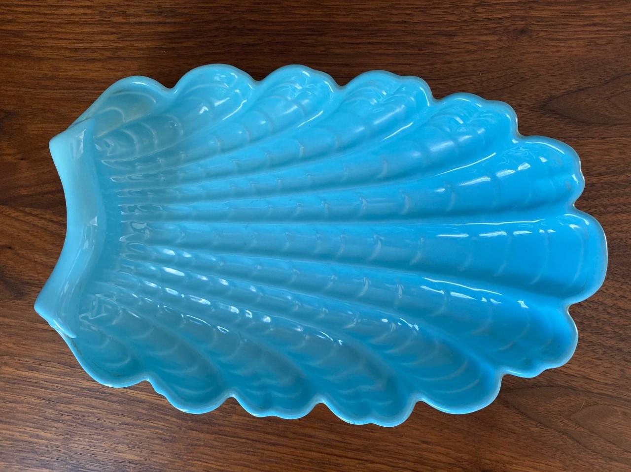 Beautiful and unique antique pastel blue colored decorative tray/dish. The art deco shell-like pattern makes this piece a centerpiece in itself. Great condition. Great addition to your art deco or eclectic décor style.