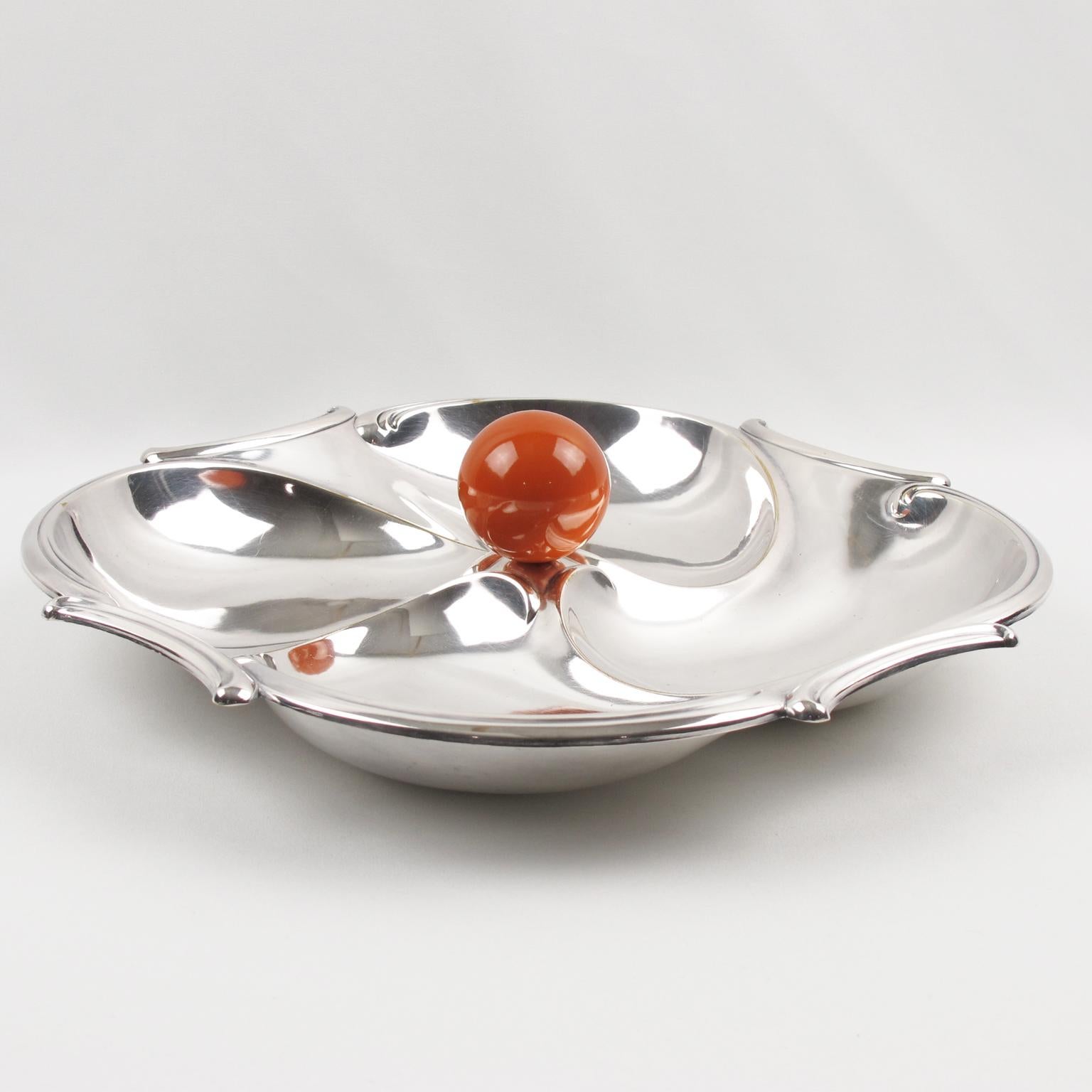 French Art Deco barware serving set for hors d'oeuvres, cocktail, snack, or appetizers by silversmith Maison Bezou, Paris. Features a large dimensional rounded polished silver plate serving tray with four compartments and an orange Bakelite ball