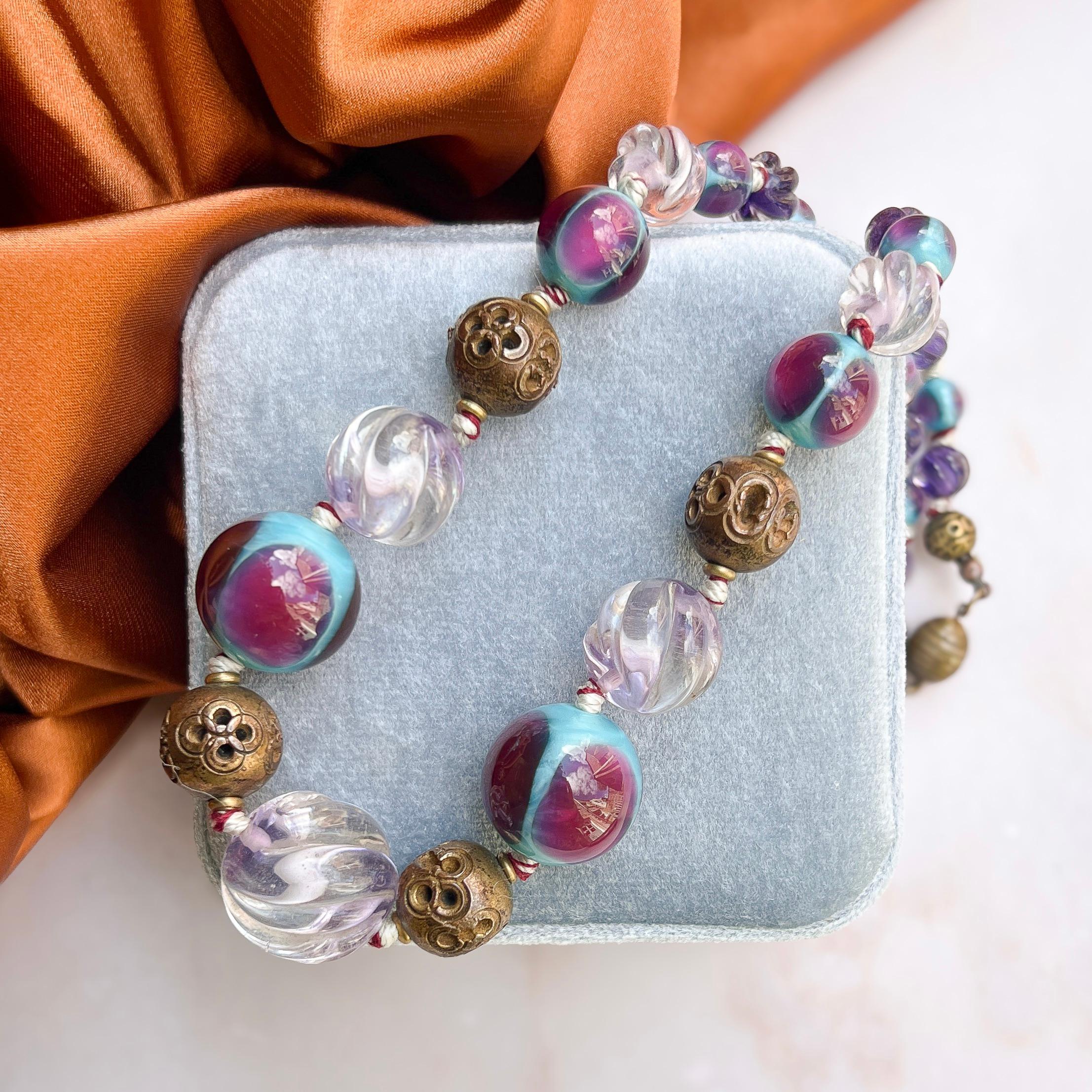 Made in France, with its unusual and high quality beads, this necklace is likely to have been created by the Louis Rousselet company.

Condition Report:
Excellent - The necklace has been professionally re-strung using a two-tone thread similar to