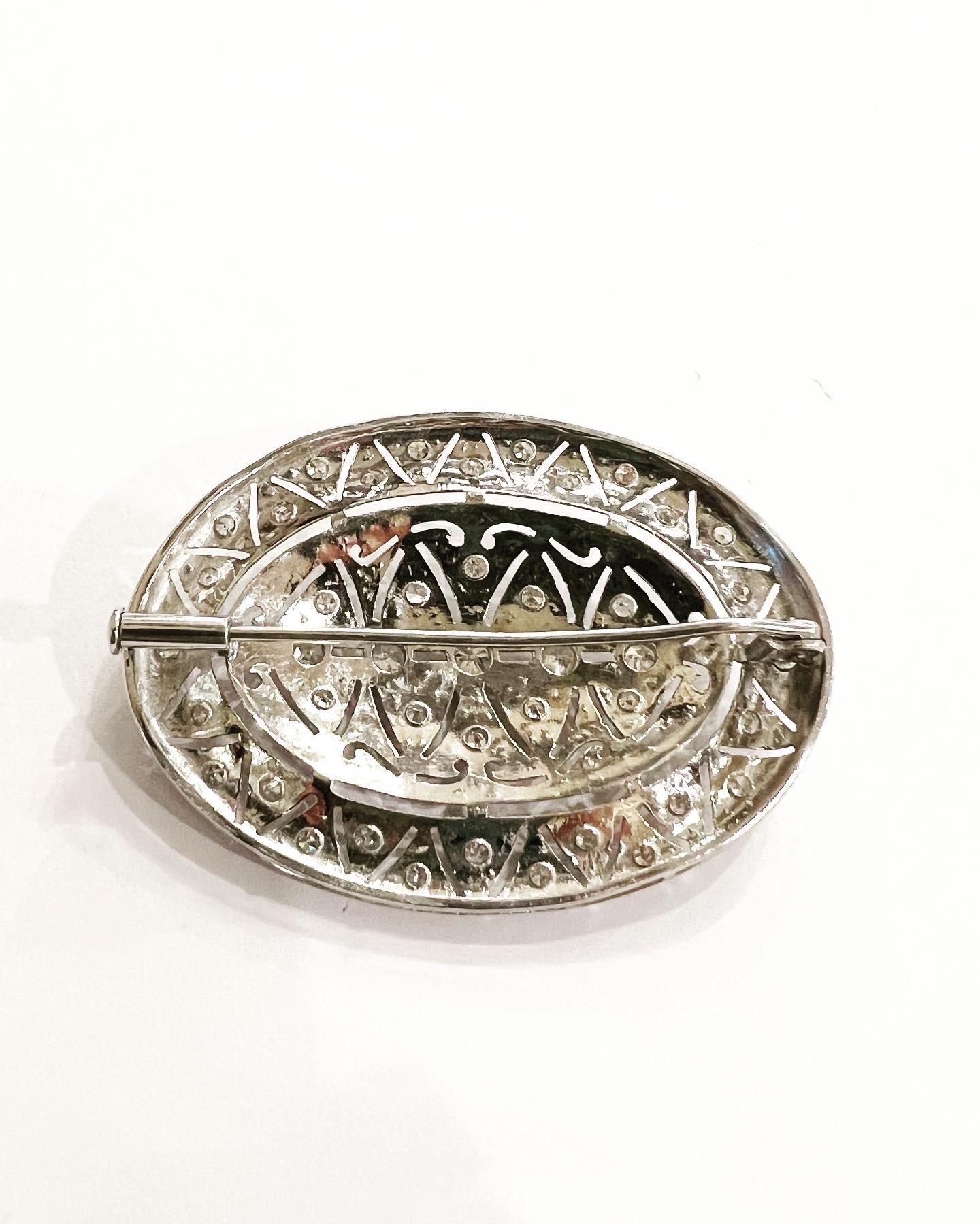 Women's or Men's Art Deco 1930s Oval Diamond Filigree 18k White Gold Brooch For Sale