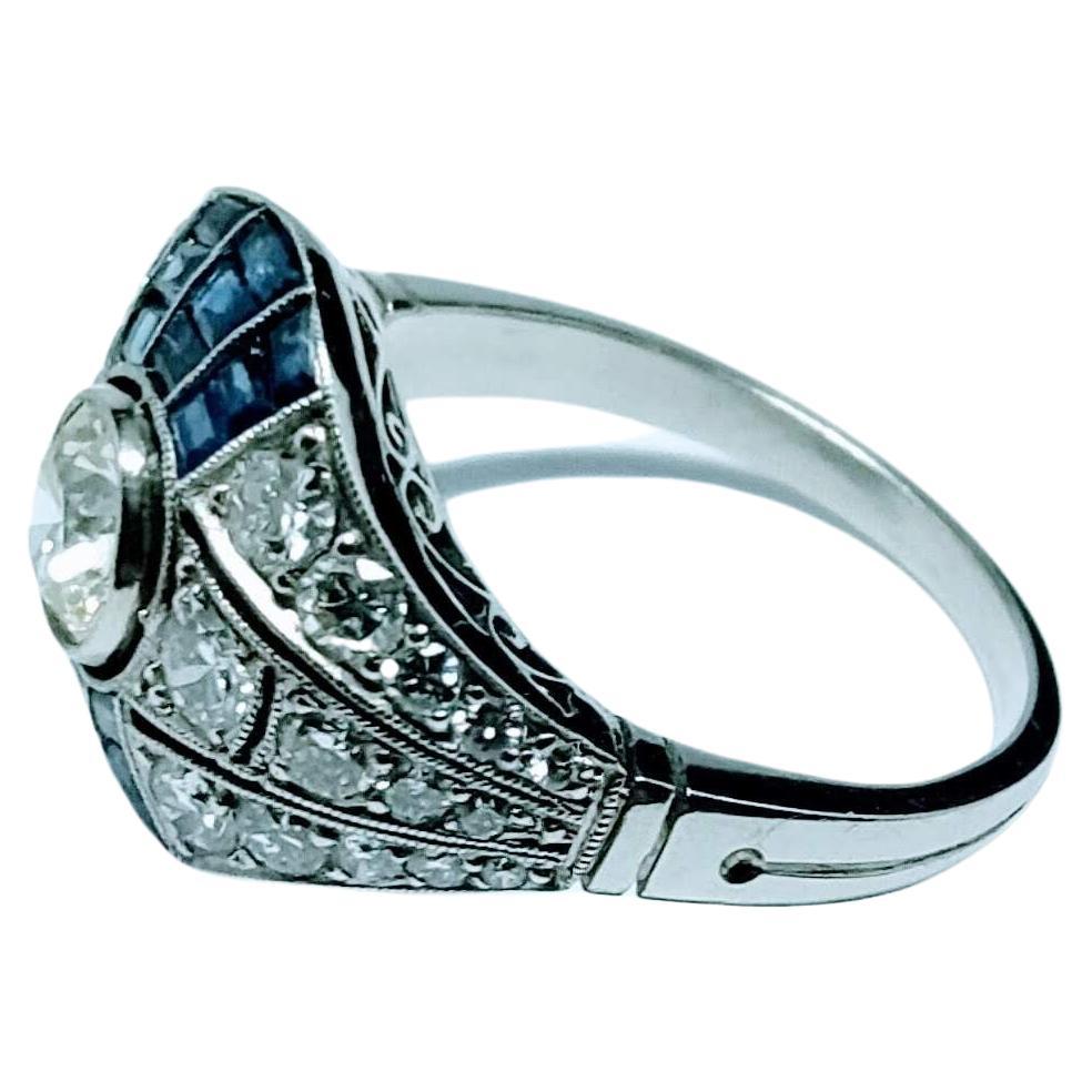 Vintage Art Deco 1930s Ring Brilliant Cut Diamond 0.65 Cts and Sapphire Platinum For Sale 6