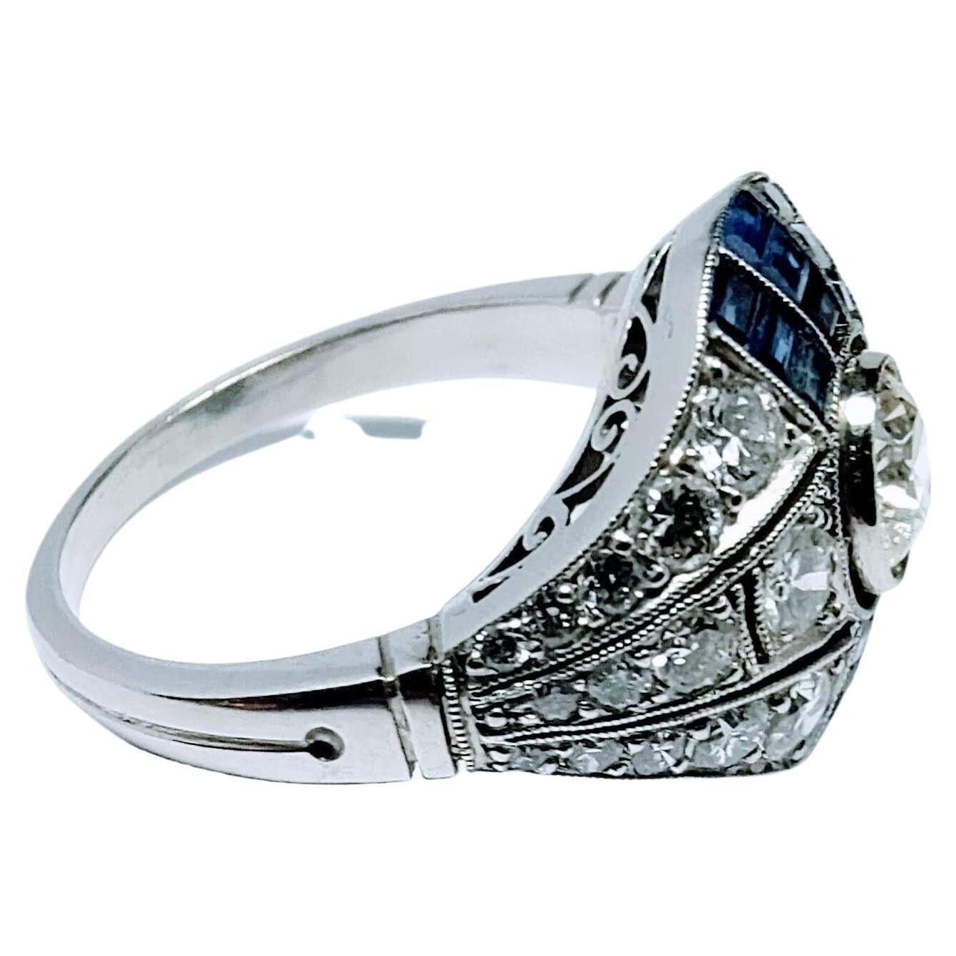 Vintage Art Deco 1930s Ring Brilliant Cut Diamond 0.65 Cts and Sapphire Platinum For Sale 7