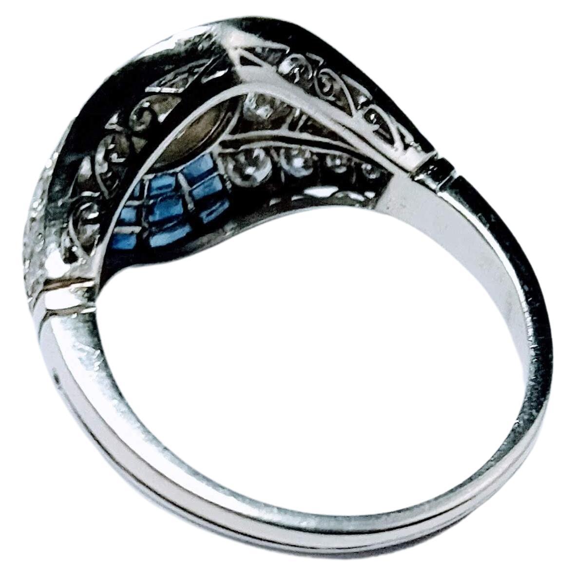 Vintage Art Deco 1930s Ring Brilliant Cut Diamond 0.65 Cts and Sapphire Platinum For Sale 8