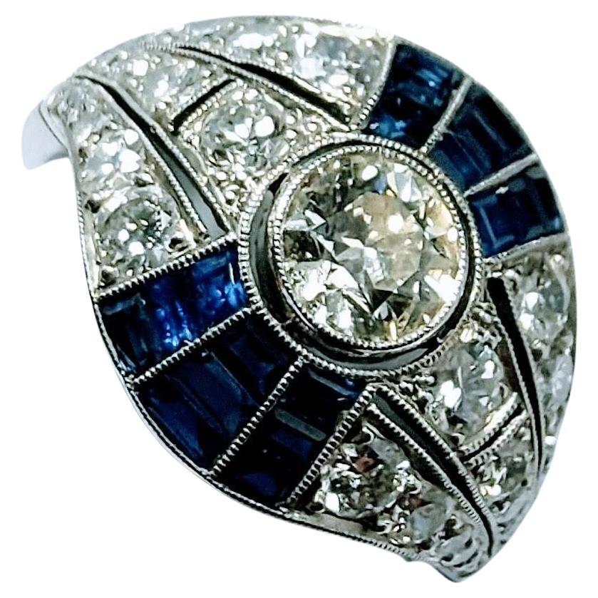 Vintage Art Deco 1930s Ring Brilliant Cut Diamond 0.65 Cts and Sapphire Platinum For Sale 1