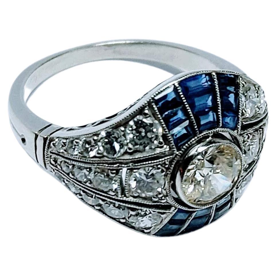 Vintage Art Deco 1930s Ring Brilliant Cut Diamond 0.65 Cts and Sapphire Platinum For Sale 2