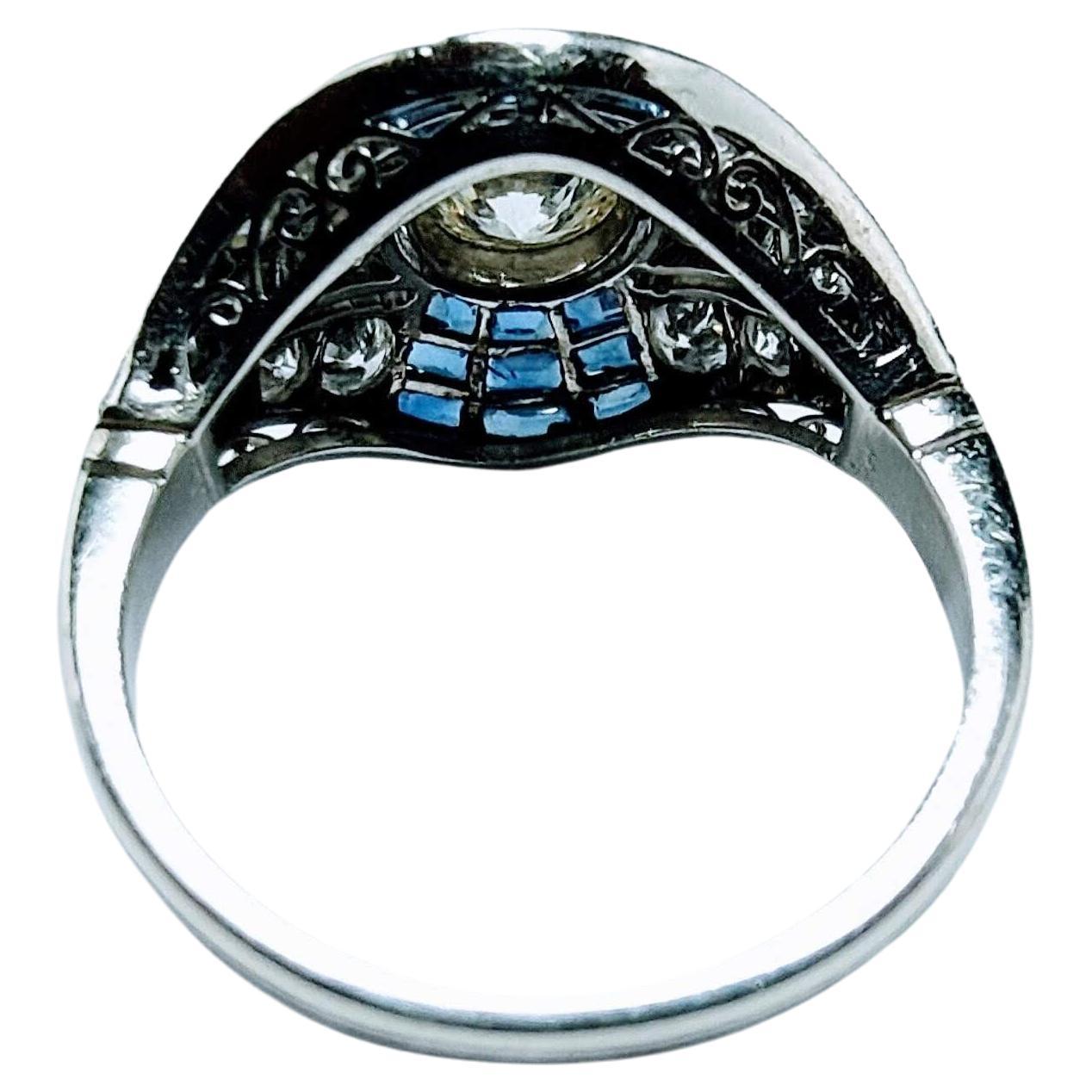 Vintage Art Deco 1930s Ring Brilliant Cut Diamond 0.65 Cts and Sapphire Platinum For Sale 3