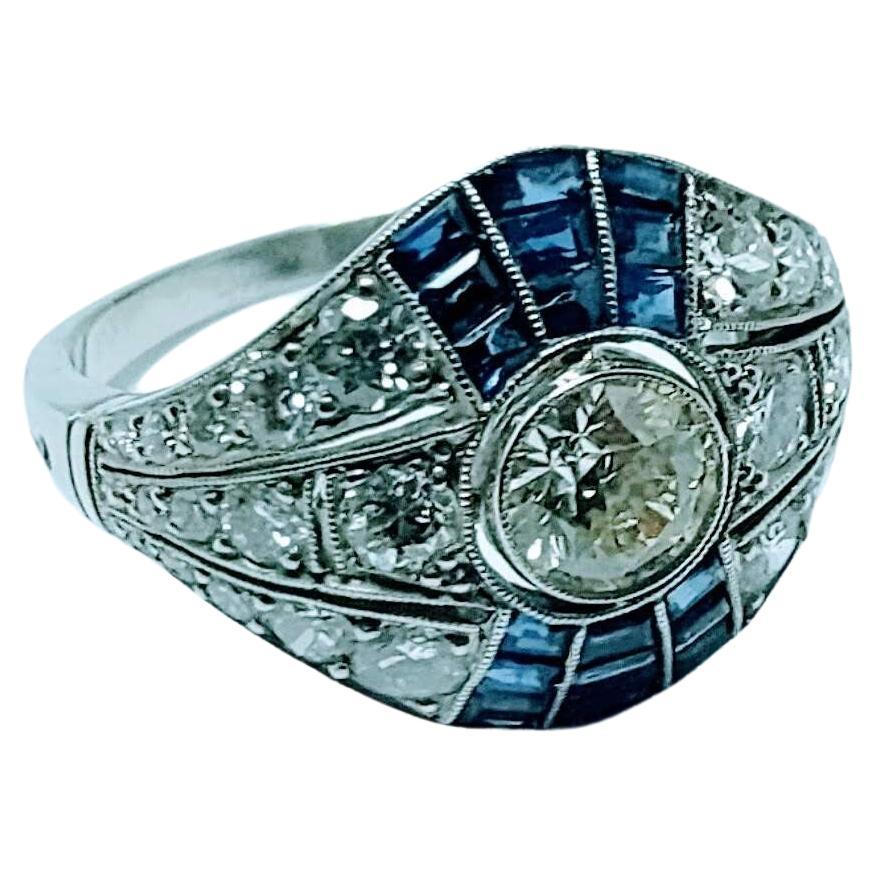 Vintage Art Deco 1930s Ring Brilliant Cut Diamond 0.65 Cts and Sapphire Platinum For Sale 4