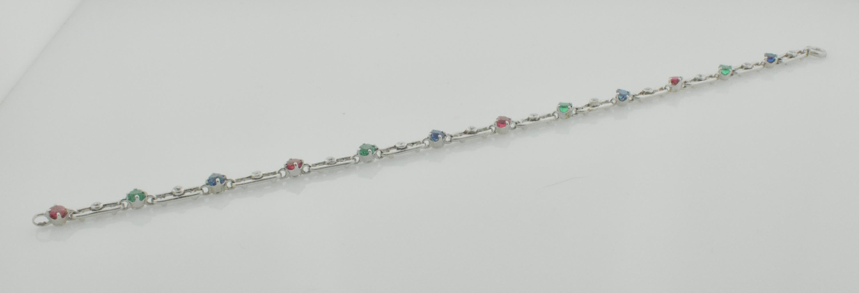 Old European Cut Art Deco 1930's Ruby, Emerald, Sapphire and Diamond Bracelet in Platinum