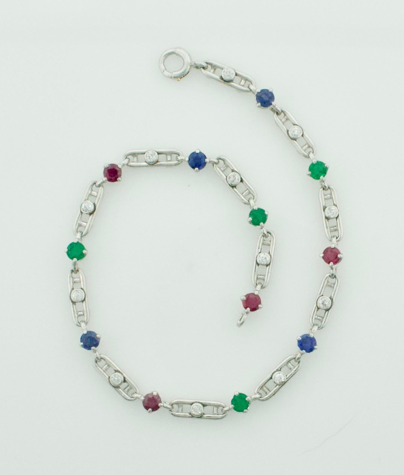 Women's or Men's Art Deco 1930's Ruby, Emerald, Sapphire and Diamond Bracelet in Platinum