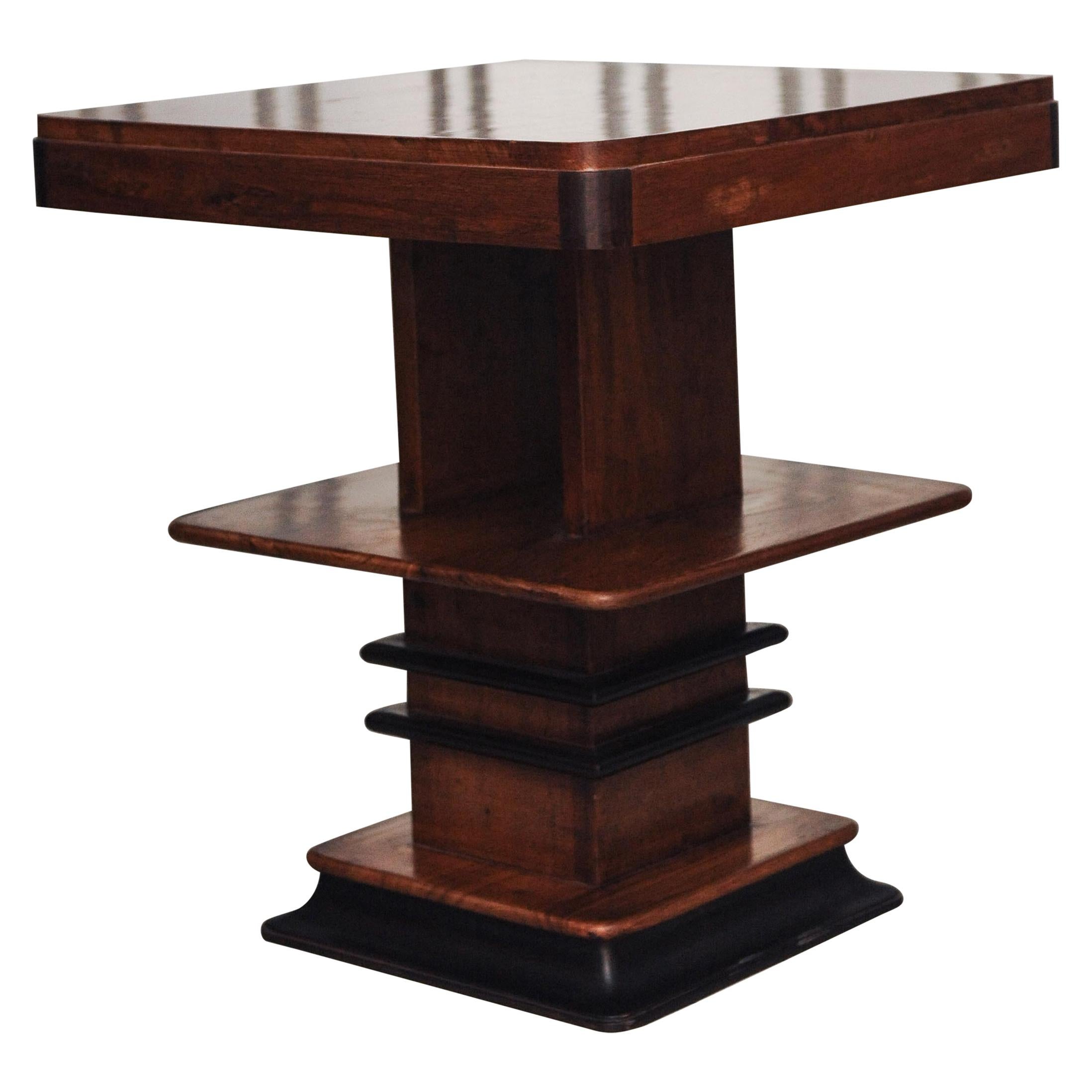 1930s walnut and lacquered Art Deco three-tiered graduated side tables.