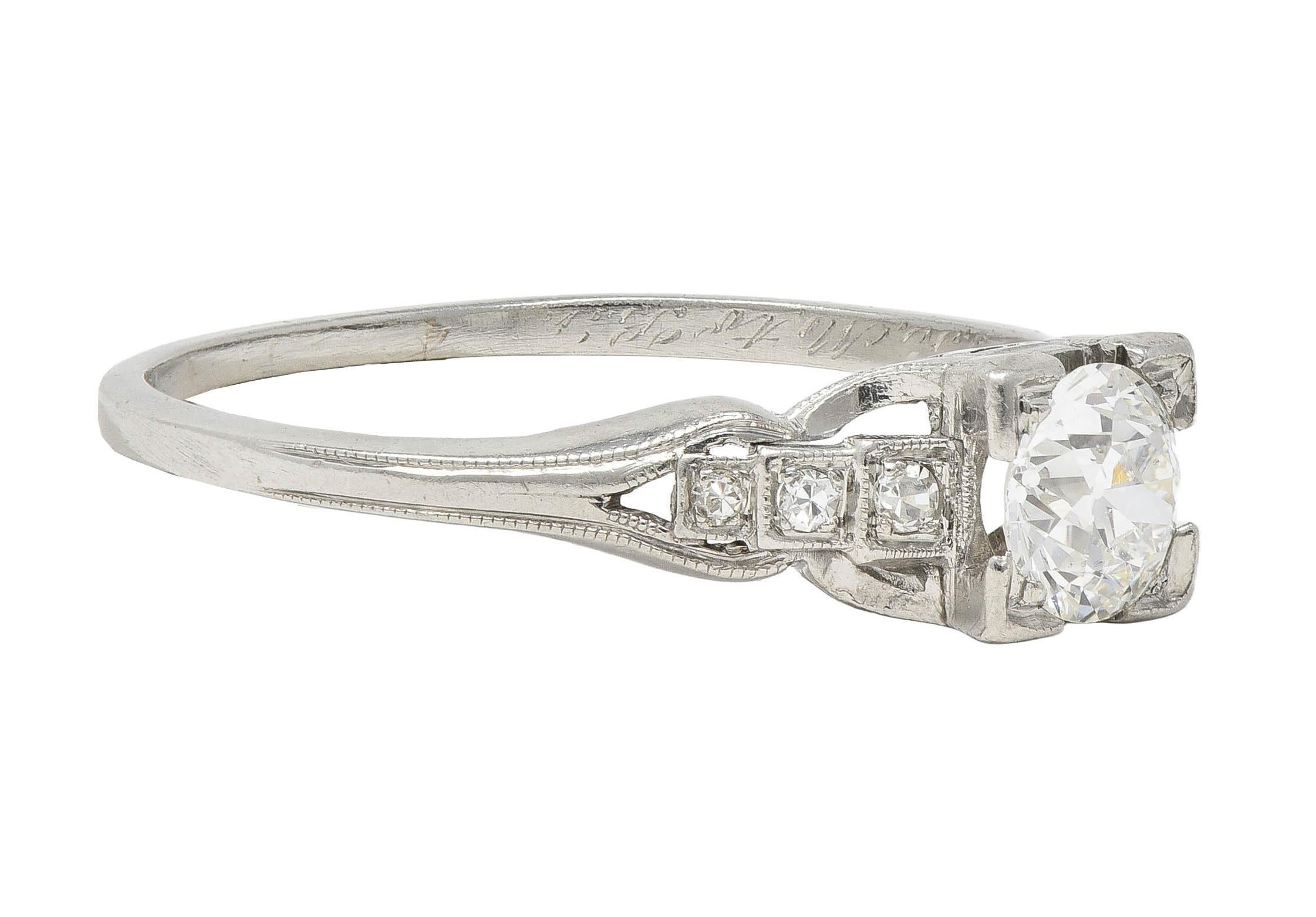 Round Cut Art Deco 1933 0.68 CTW Diamond Platinum Vintage Stepped Engagement Ring For Sale