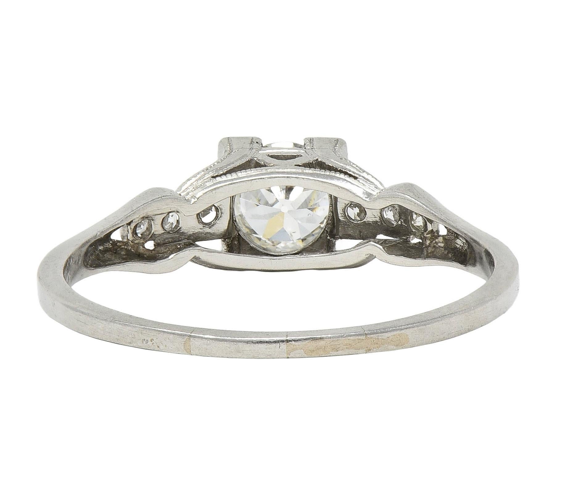 Women's or Men's Art Deco 1933 0.68 CTW Diamond Platinum Vintage Stepped Engagement Ring For Sale