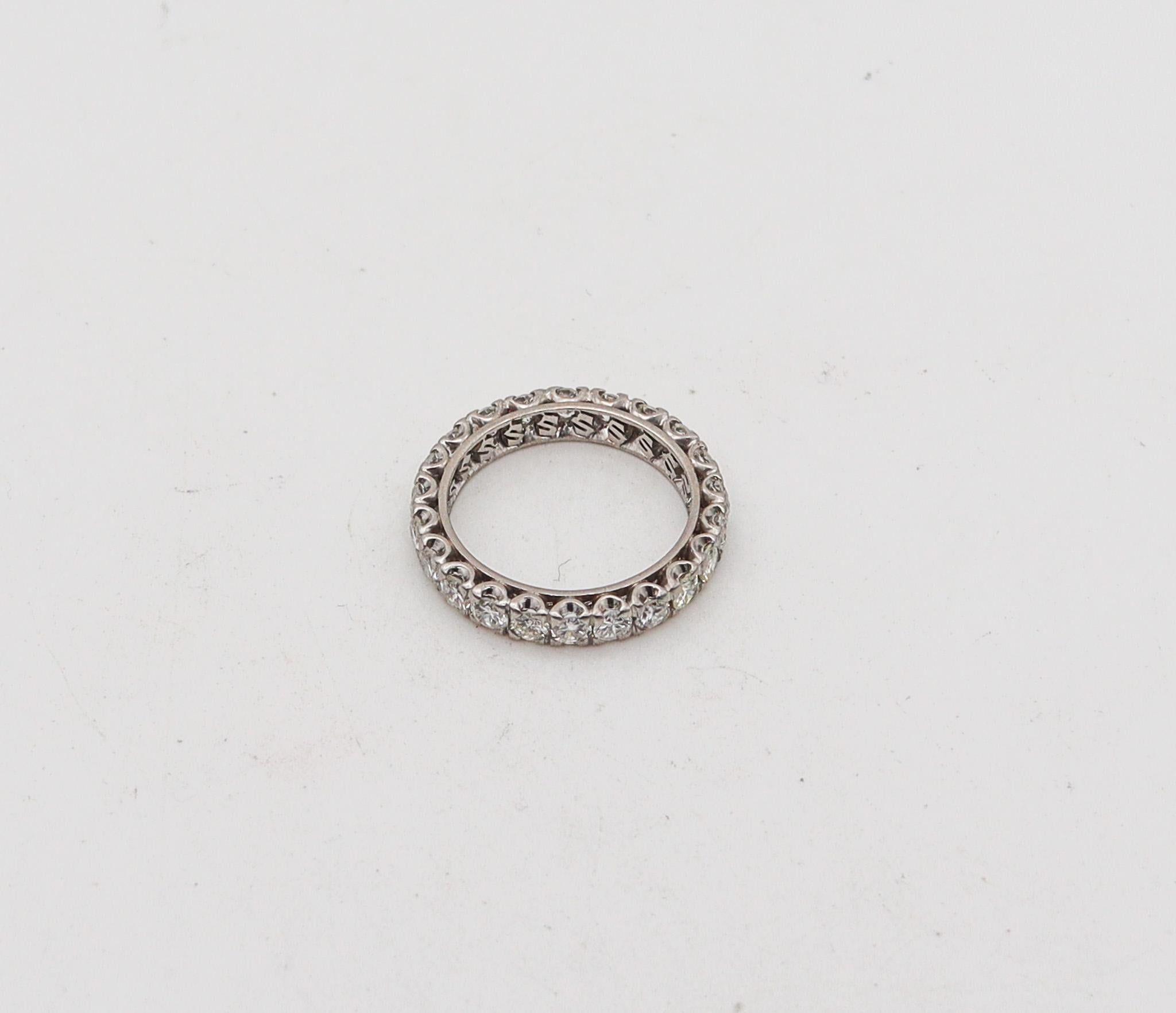 An eternity ring band with diamonds.

Gorgeous calibrated eternity band ring, created in America during the Art Deco period, back in the 1935. It was crafted in solid .900/.999 platinum with high polished finish and embellished with a great