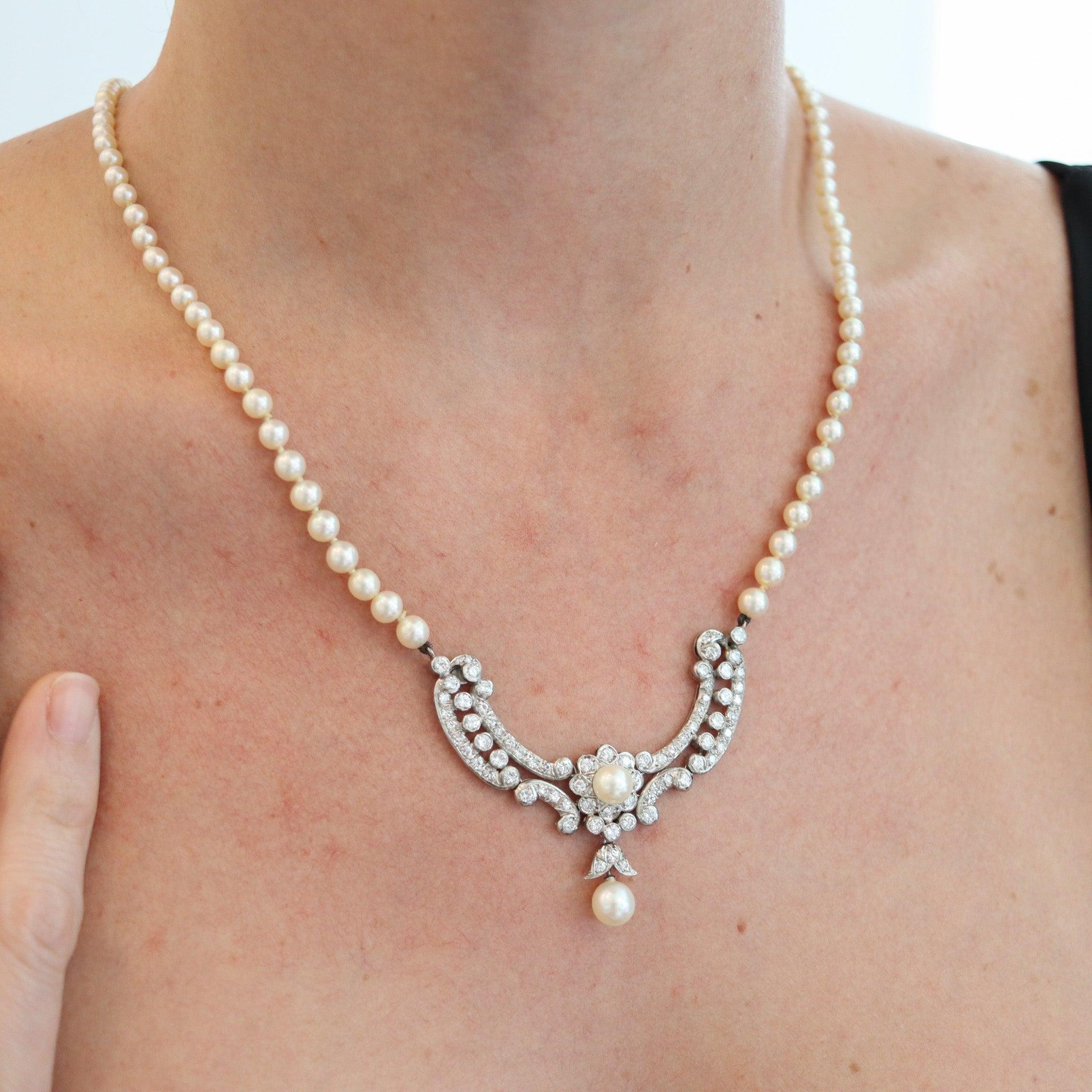 Art deco graduated pearls necklace with diamonds.

This is a very elegant necklace, created in America during the art-deco period, back in the 1930's. The main decorative element of the necklace has been crafted in solid platinum, which is attached
