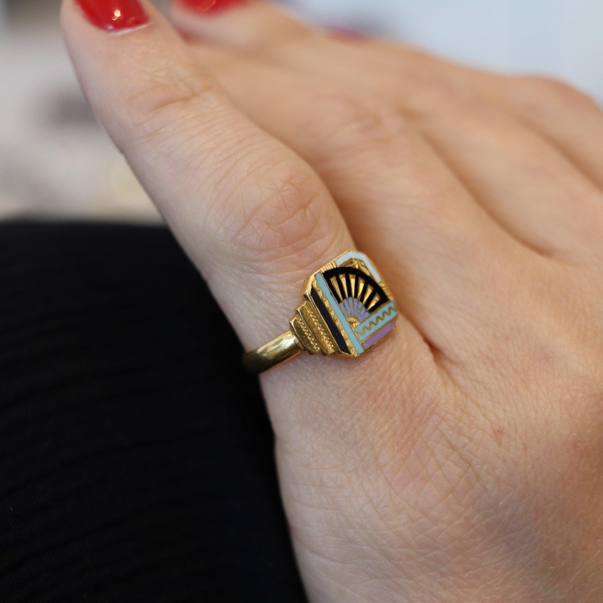 An enameled art deco Japonisme ring.

This is a very unusual and colorful ring, created during the art deco period, circa 1935. The ring was beautifully crafted with Japonisme patterns in solid rich yellow gold of 18 karats with high polished finish