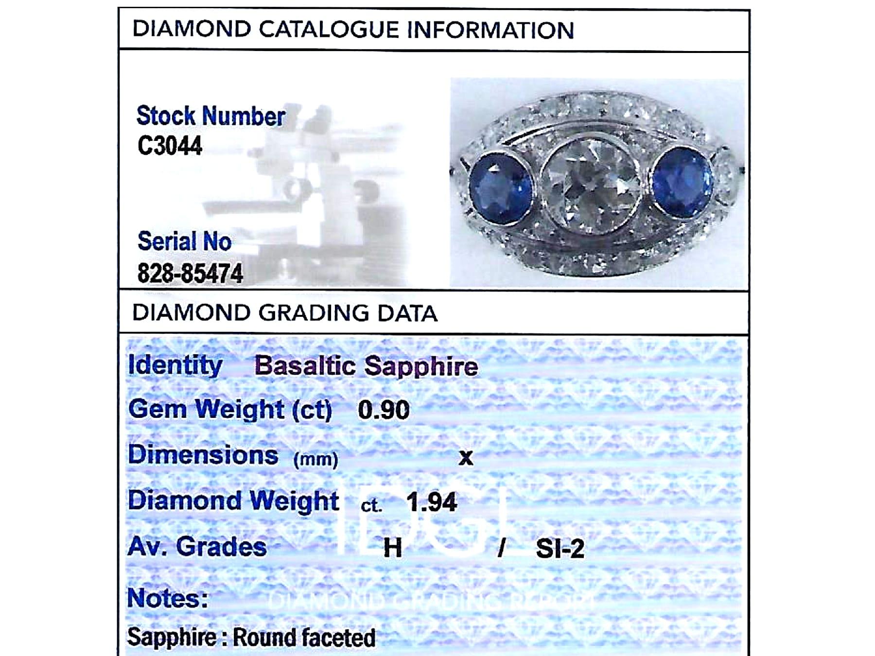 Art Deco 1.94 Carat Diamond and Sapphire Platinum Cocktail Ring For Sale 3