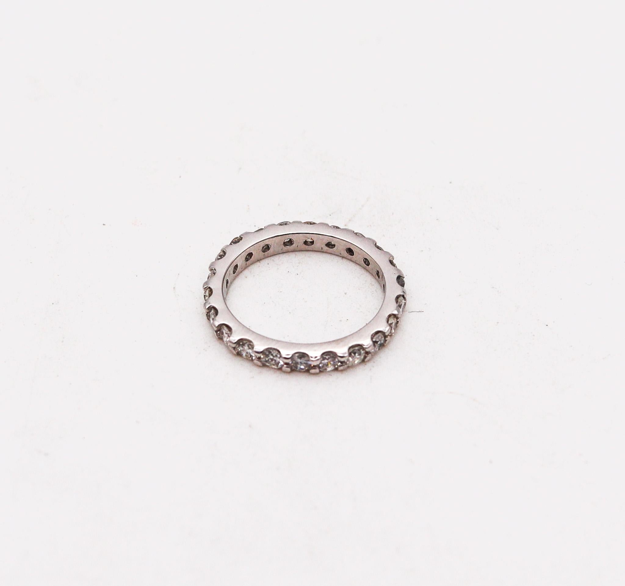 An eternity ring band with Natural Diamonds.

Beautiful classic art-Deco eternity ring made in America, circa 1940. It was crafted in solid .900/.999 platinum with high polished finish and mount with a nice selection of calibrated natural earth