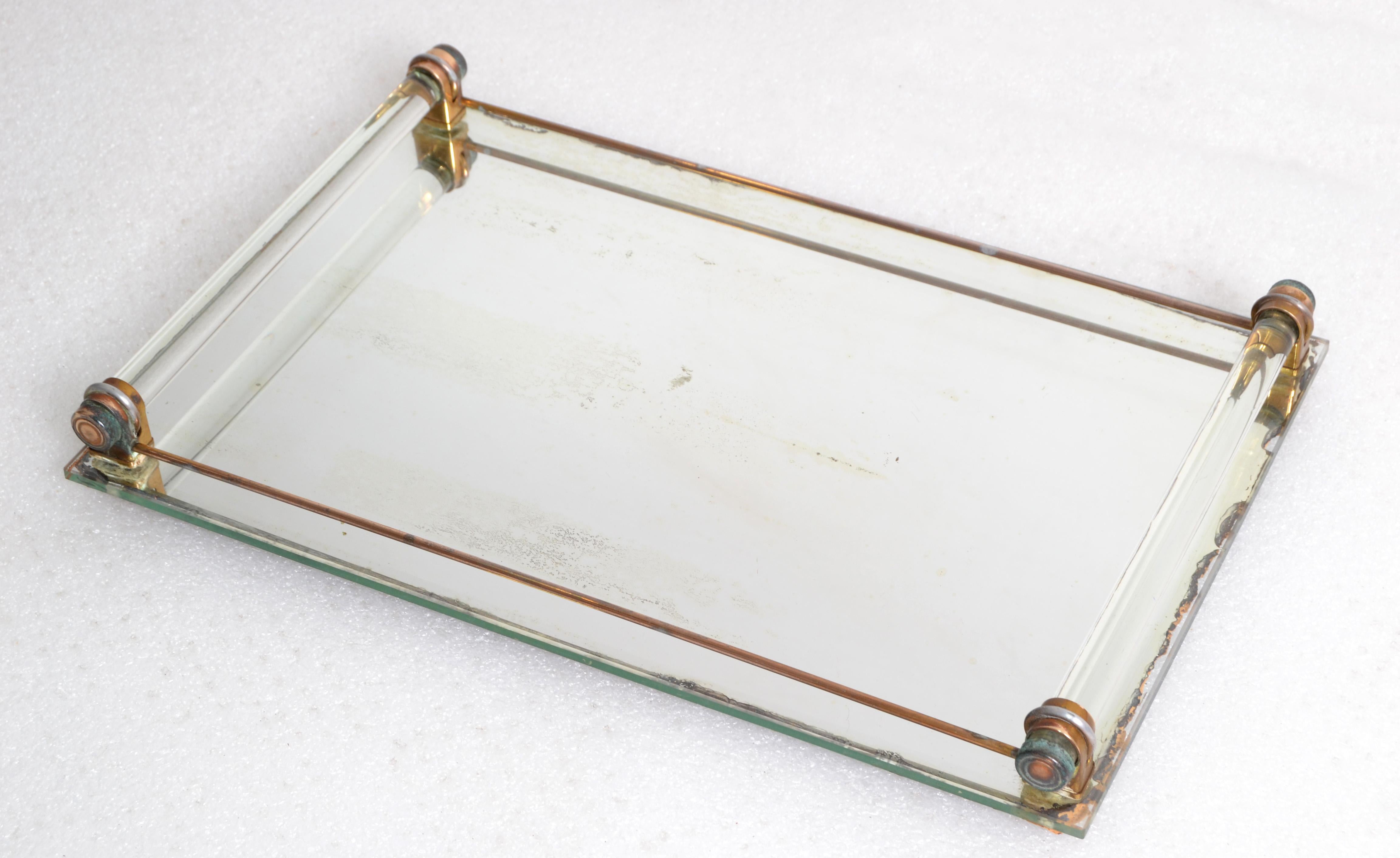 Art Deco Period Mirrored vanity tray or drink serving tray with copper frame and silver plate metal.
In all original condition with age related patina and foxing to the Mirror, but no chips or cracks.