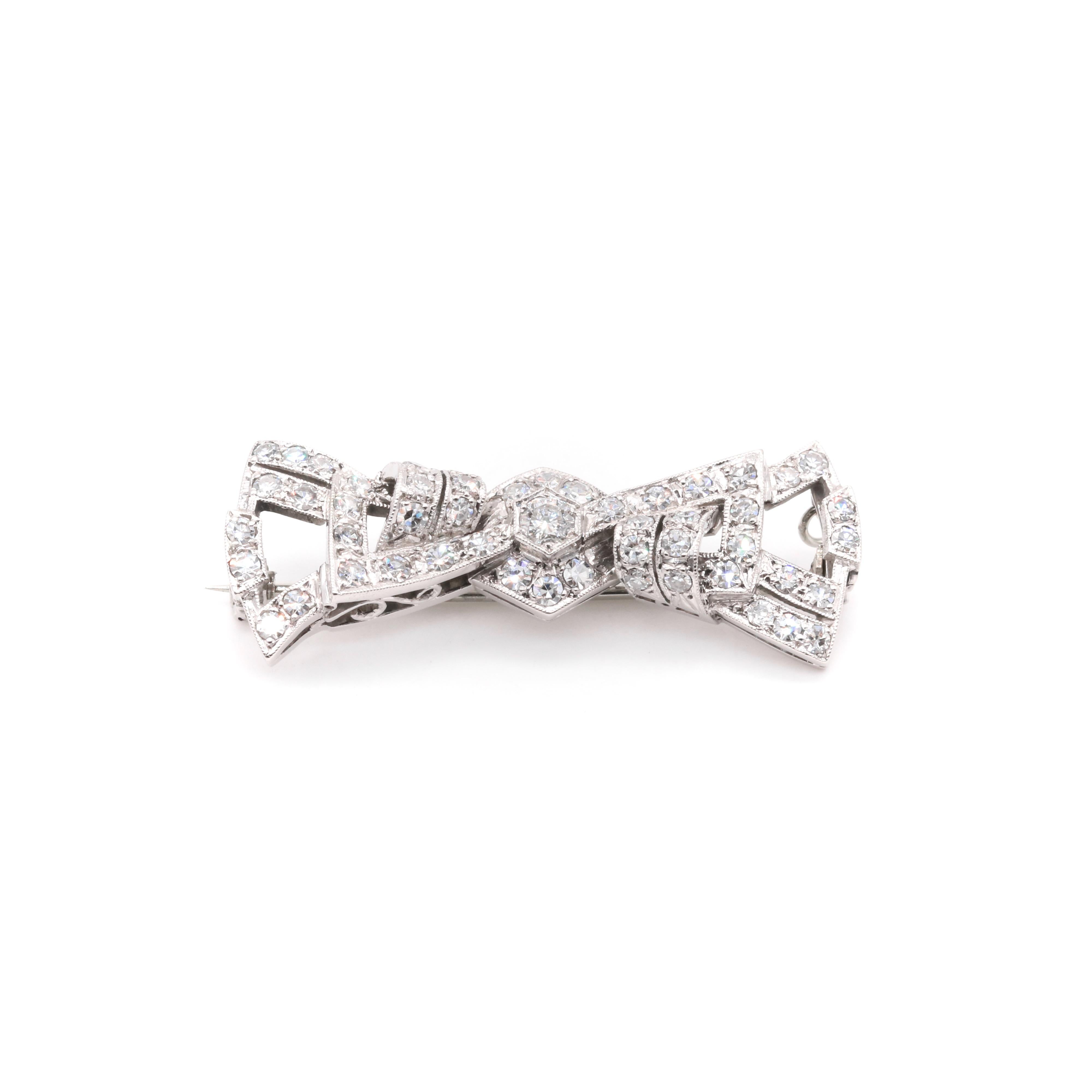 Women's or Men's Art Deco 1940s Palladium Diamond Stylised Bow Brooch For Sale
