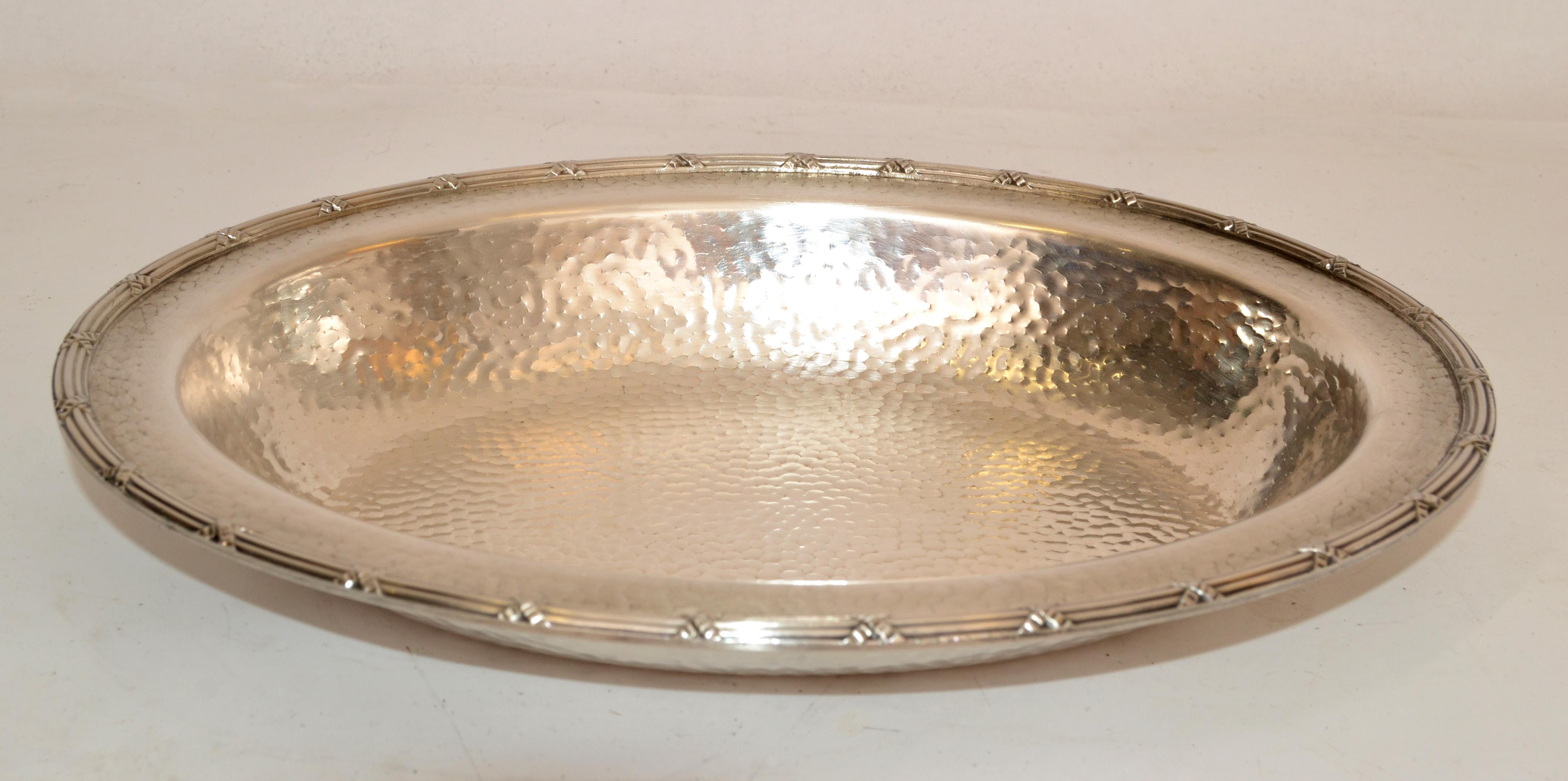 1960s Art Deco hand-hammered oval silver plate detail bowl, centerpiece.
Silver Markings at the base, EPNS 2245.
Great quality craftsmanship.
Perfect for Your Holiday Gift Collection.