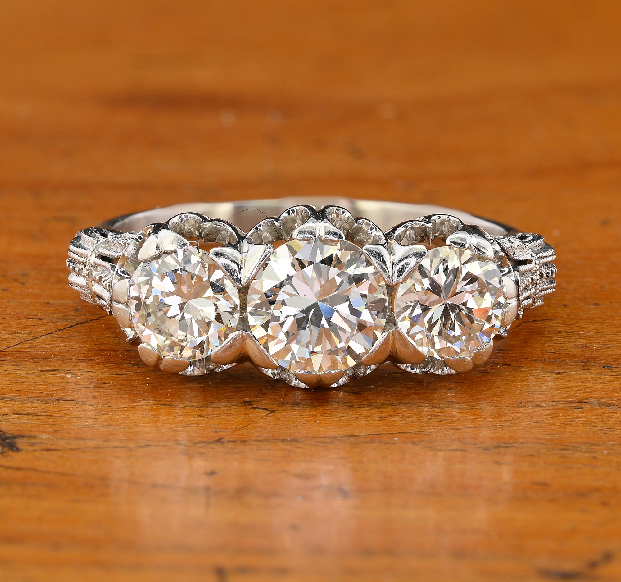 This outstanding antique Diamond ring is Art Deco period, 1925 ca
A distinctive example of the era superbly hand crafted of solid Platinum in a more than exquisite design
Set with a selection of bright white early transitional brilliant cut full of