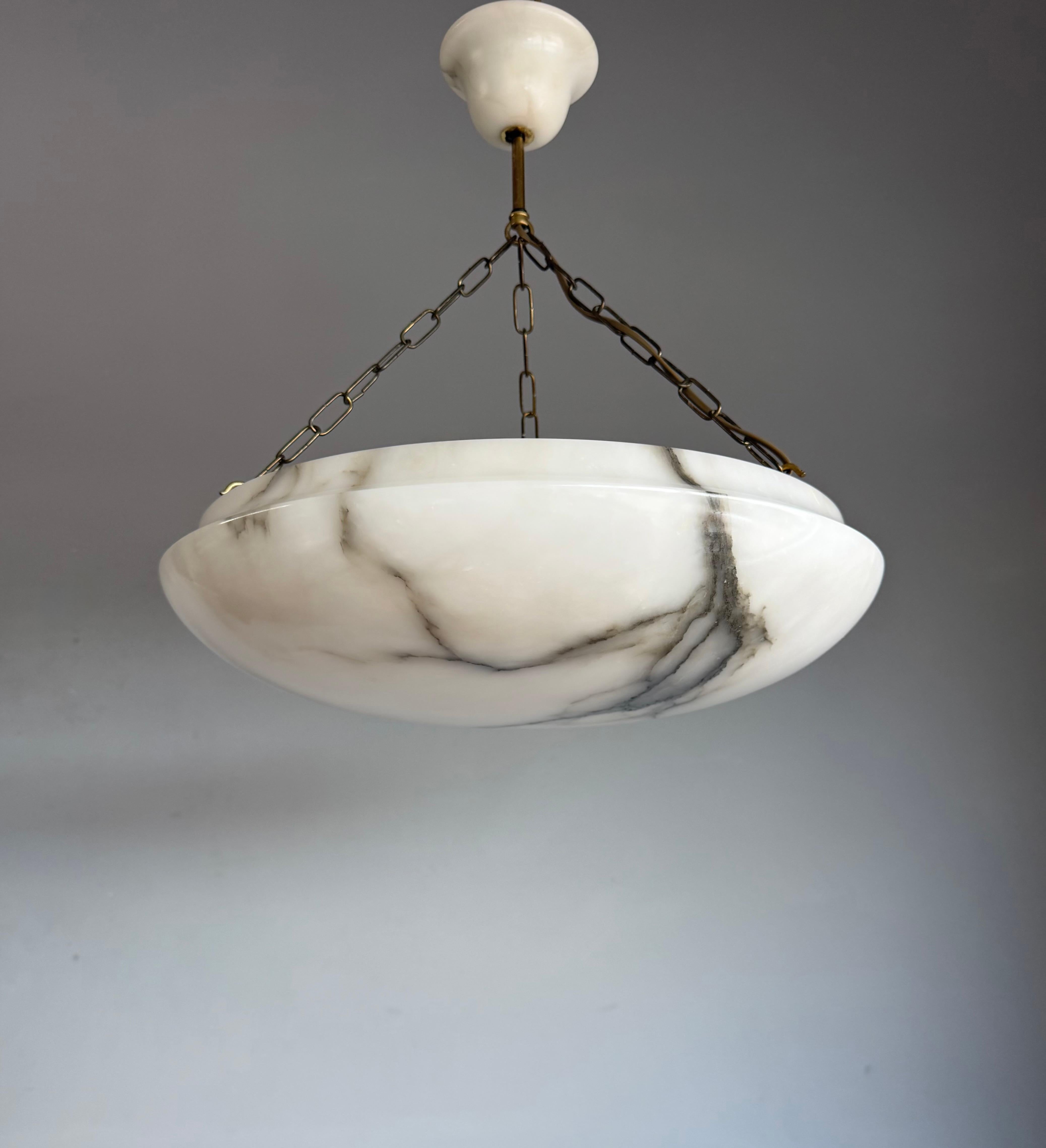 Hand-Carved Art Deco 19.8” Diameter Perfectly Balanced White & Black Alabaster Pendant Light For Sale