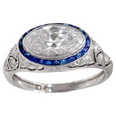 Art Deco 2 carat moval cut diamond sapphire platinum engagement ring