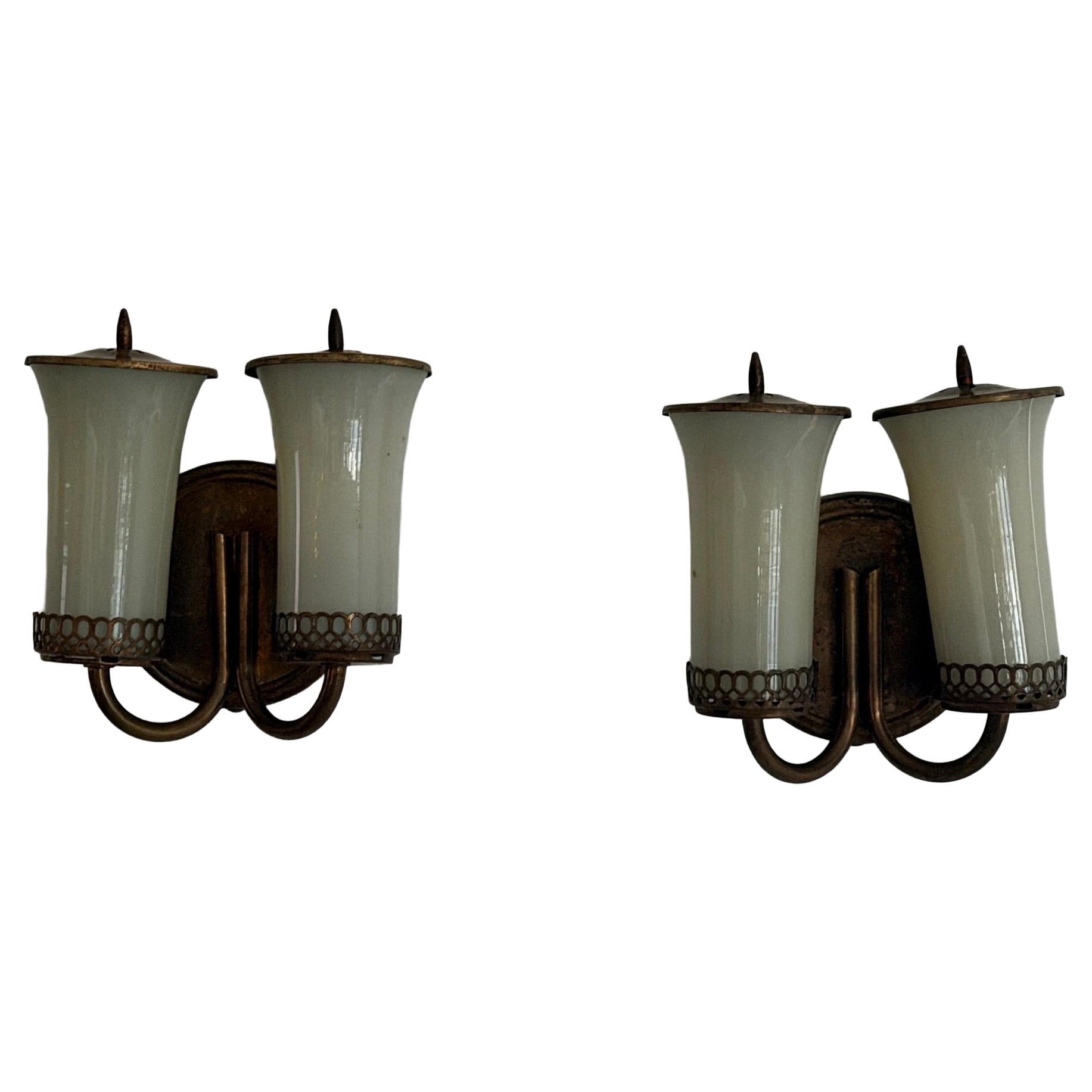 Paire d
appliques Art déco à 2 têtes en laiton et verre jaune, années 1940, Allemagne en vente