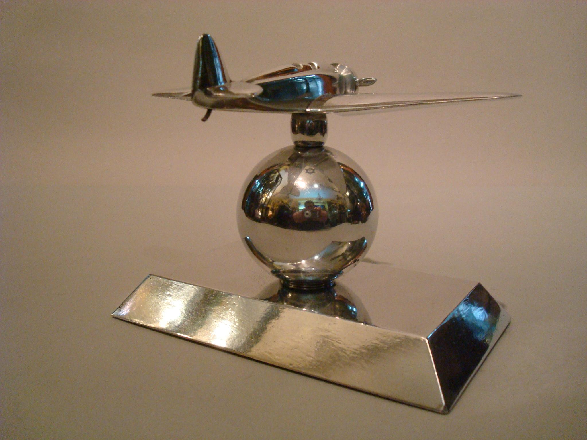 20th Century Art Deco Mid-20 Century Airplane Fighter over the World Paperweight, 1930s