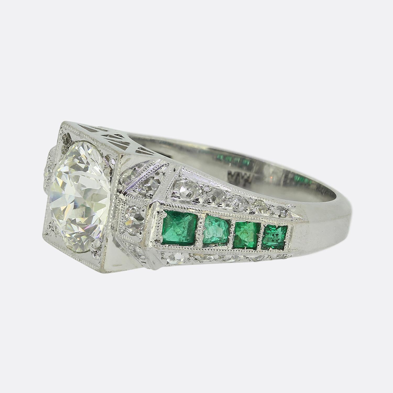 Here we have a remarkable piece created at a time when the Art Deco style was at the height of world design. This ring has been crafted from 14ct white gold and presents a breathtaking 2.65ct round faceted old European cut diamond at the centre of