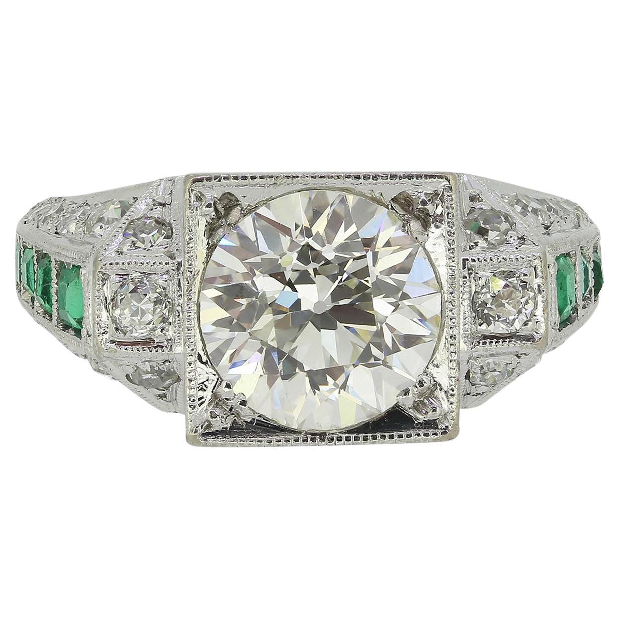 Art Deco 2.65 Carat Diamond and Emerald Ring For Sale