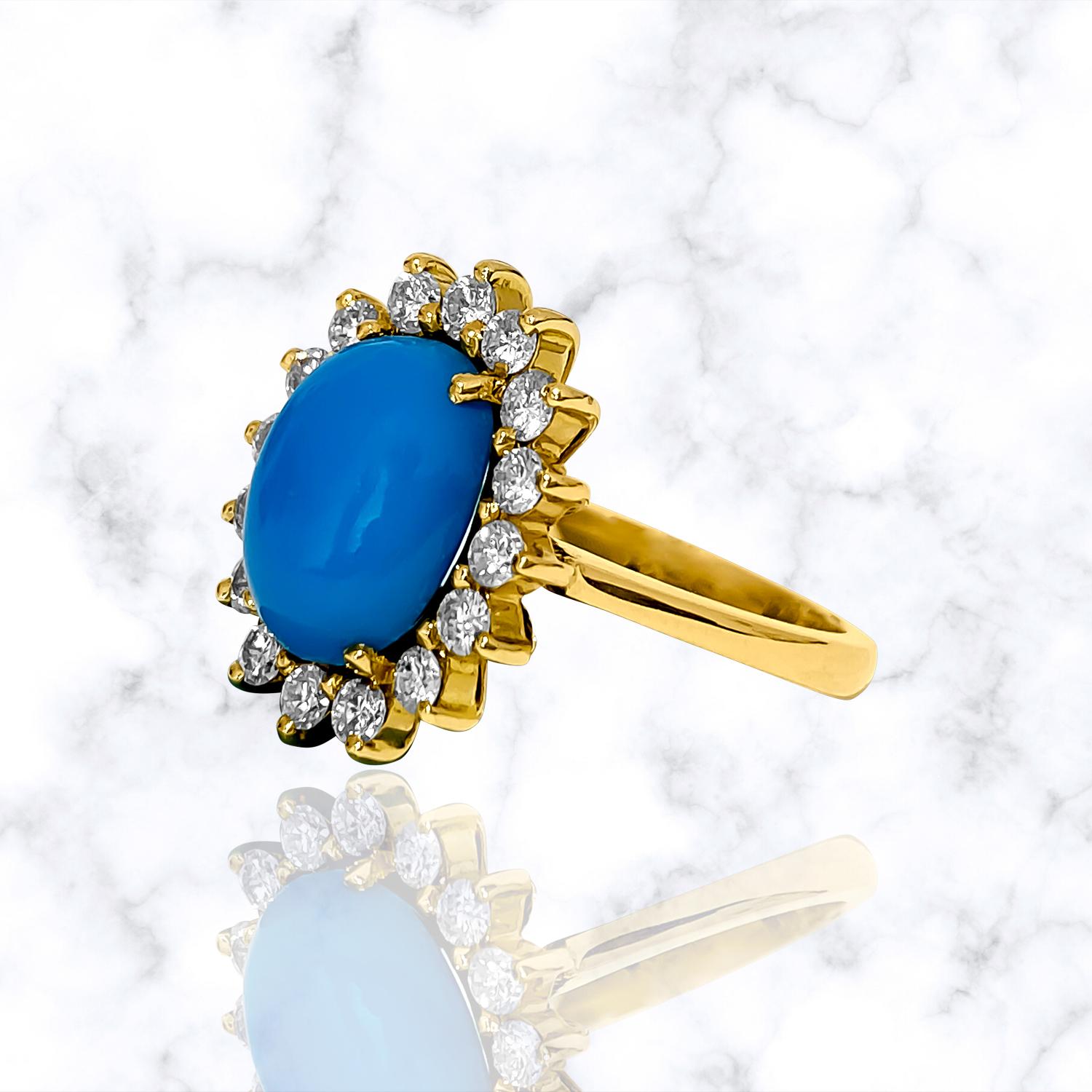 Crafted in luxurious 18K yellow gold, this exquisite cocktail ring features a captivating 2.00 carat oval-shaped turquoise, embraced by a total of 1.00 carats of round brilliant-cut diamonds on the sides. All gems are 100% natural earth mined and
