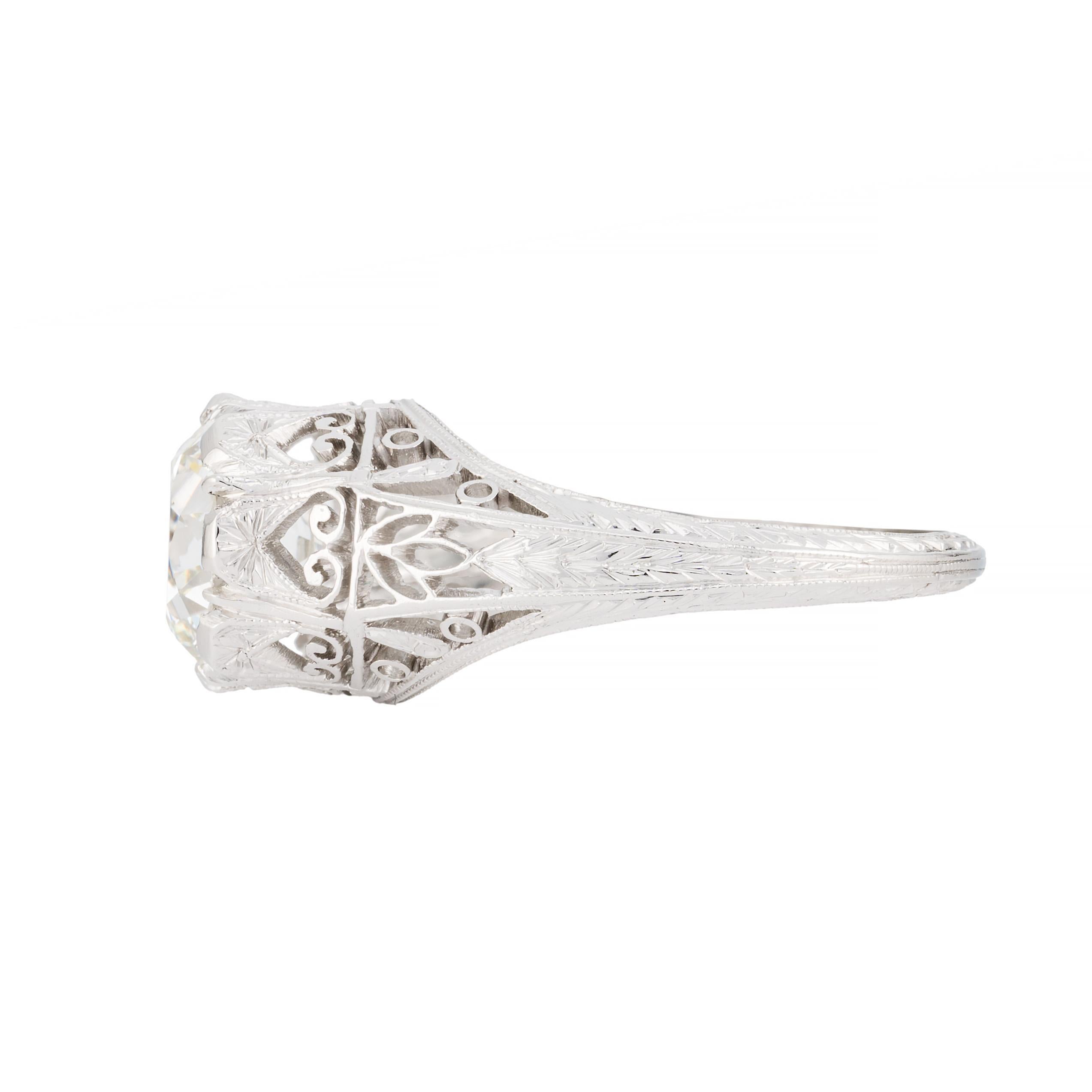 Aston Estate Jewelry Presents:

A captivating engagement ring featuring a 2.02 carat European cut diamond of VS2 clarity with I color. The diamond is elegantly set in a detailed mounting, highlighting its exquisite facets.  The handmade mounting