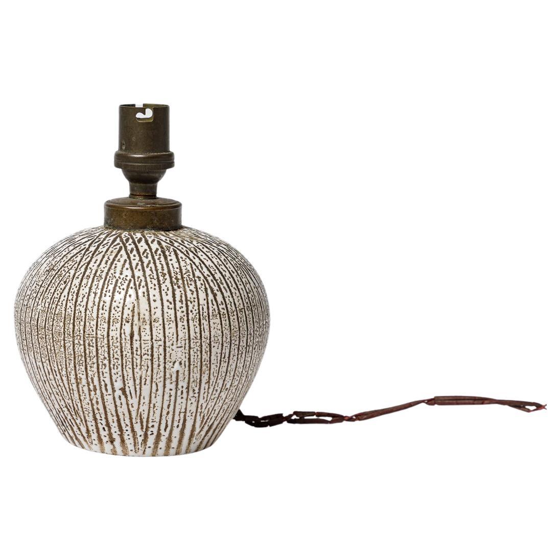 Lampe à poser art déco 20e siècle en céramique desin blanche et noire style Besnard