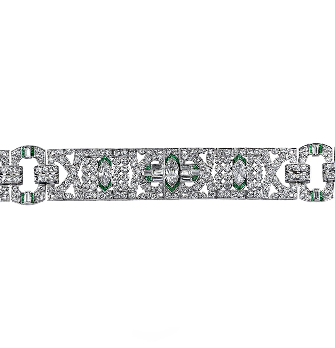 Spectacular Art Deco bracelet Circa 1920 intricately hand crafted in platinum featuring old European cut and mixed cut diamonds weighing approximately 21 carats total, G-I color, VS-SI clarity. intricately set with millgrain. This sensational bold