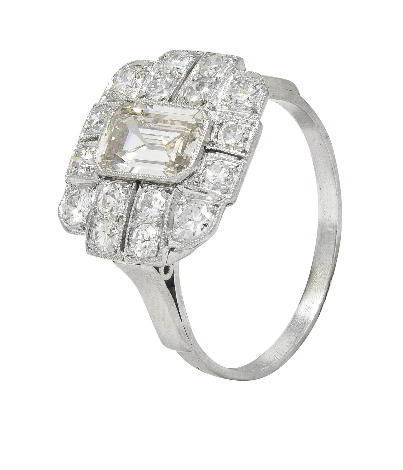 Art Deco 2.10 CTW Emerald Cut Diamond Platinum Vintage Cluster Ring In Excellent Condition For Sale In Philadelphia, PA