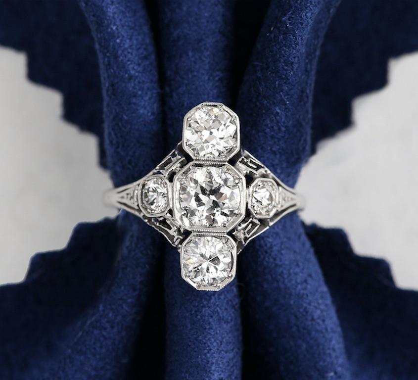 Art Deco 2.10 Carat OEC Diamond and Platinum Three-Stone Ring, circa 1925 10
