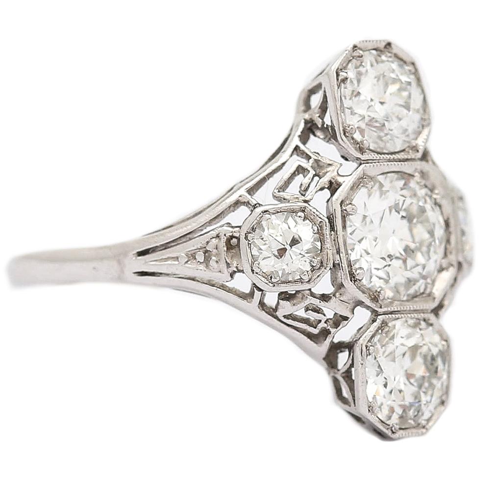 Women's Art Deco 2.10 Carat OEC Diamond and Platinum Three-Stone Ring, circa 1925