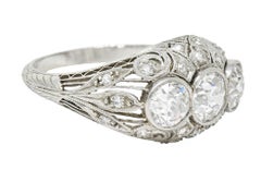 Art Deco 2.12 Carats Diamond Platinum Three Stone Bombe Band Ring
