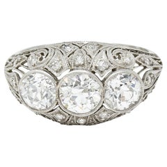 Art Deco 2.12 Carats Diamond Platinum Three Stone Bombe Band Ring