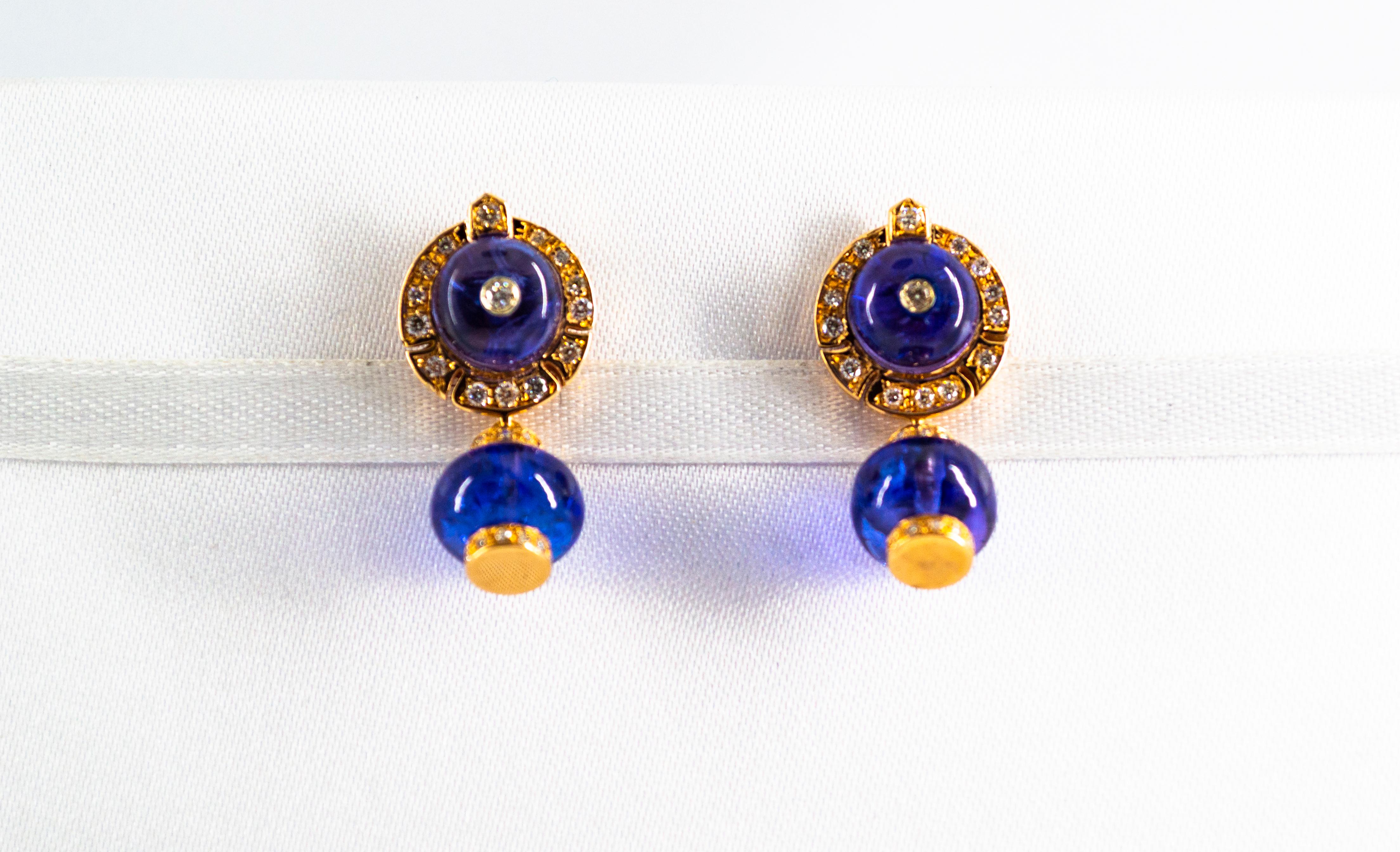 These Earrings are made of 14K Yellow Gold.
These Earrings have 0.50 Carats of White Modern Round Cut Diamonds.
These Earrings have 21.00 Carats of Tanzanite.
All our Earrings have pins for pierced ears but we can change the closure and make any of