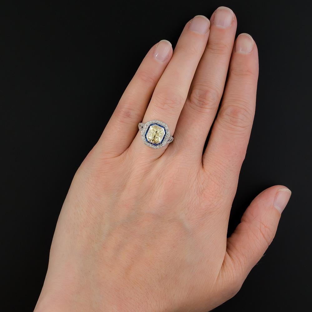 Art Deco 2.18 Carat Fancy Yellow Diamond Ring with Calibre Sapphires In Excellent Condition In San Francisco, CA