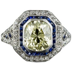 Art Deco 2.18 Carat Fancy Yellow Diamond Ring with Calibre Sapphires
